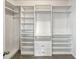 Walk-in closet featuring shelving units and drawers for ample storage space at 3125 Winesap Way, Winter Garden, FL 34787