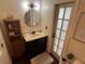 Modern bathroom with a vanity, toilet and decorative art at 9524 Bay Vista Estates Blvd, Orlando, FL 32836