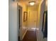 Bright hallway with wood floors and access to other rooms at 9524 Bay Vista Estates Blvd, Orlando, FL 32836