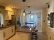 Renovated kitchen with granite countertops and stainless steel appliances at 9524 Bay Vista Estates Blvd, Orlando, FL 32836