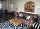 Spacious living room with leather sofa and a wooden coffee table at 9524 Bay Vista Estates Blvd, Orlando, FL 32836
