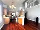 Charming kitchen boasts stainless steel appliances, light wood cabinets, and beautiful wood floors at 1817 Baillie Glass Ln, Orlando, FL 32835