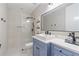 Modern bathroom with a walk-in shower and a floating vanity at 222 Acadia Ter, Celebration, FL 34747