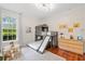 Cozy bedroom with bunk beds, built-in dresser, and plenty of natural light at 222 Acadia Ter, Celebration, FL 34747