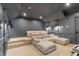 Spacious home theater with a comfy sectional sofa at 222 Acadia Ter, Celebration, FL 34747