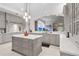 Spacious kitchen boasts modern cabinetry, large island, and stainless steel appliances at 222 Acadia Ter, Celebration, FL 34747