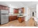 Basement kitchen with granite countertop and stainless steel appliances at 222 Acadia Ter, Celebration, FL 34747