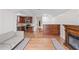 Open living space with a kitchenette, bookcase, and fireplace at 222 Acadia Ter, Celebration, FL 34747