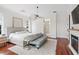Spacious main bedroom with hardwood floors, fireplace, and sitting area at 222 Acadia Ter, Celebration, FL 34747