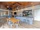 Spacious outdoor kitchen, perfect for entertaining, with a large island and seating area at 222 Acadia Ter, Celebration, FL 34747