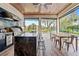 Well-equipped outdoor kitchen with a large island and pool views at 222 Acadia Ter, Celebration, FL 34747