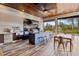 High-end outdoor kitchen featuring a large island and top-of-the-line appliances at 222 Acadia Ter, Celebration, FL 34747