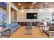 Comfortable outdoor lounge area adjacent to a beautiful pool and kitchen at 222 Acadia Ter, Celebration, FL 34747