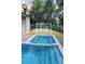 Inviting pool and spa with surrounding landscaping at 222 Acadia Ter, Celebration, FL 34747