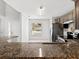 Kitchen with granite countertop and stainless steel appliances at 302 Lakebreeze Cir, Lake Mary, FL 32746