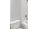 Bright bathroom featuring a white tub and shower combo with modern fixtures at 1231 Teal Creek Dr, St Cloud, FL 34771
