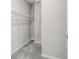 A walk-in closet with wire shelving installed for efficient storage at 1231 Teal Creek Dr, St Cloud, FL 34771