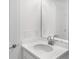 Bathroom featuring a single sink vanity with modern fixtures and a white countertop at 5267 Stone Ridge Pl, St Cloud, FL 34771