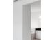 Open-concept hallway leading into a modern bathroom at 5267 Stone Ridge Pl, St Cloud, FL 34771