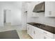 View of the kitchen with stainless steel appliances and lots of cabinets at 5267 Stone Ridge Pl, St Cloud, FL 34771