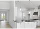 Open kitchen featuring a center island and lots of cabinet space at 5267 Stone Ridge Pl, St Cloud, FL 34771