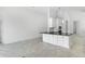Open floorplan kitchen with a center island and modern finishes at 5267 Stone Ridge Pl, St Cloud, FL 34771