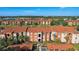 Aerial view of the community showcasing multiple residential buildings and lush landscaping at 5536 Metrowest Blvd # 8-304, Orlando, FL 32811