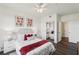 Bright bedroom features a mirrored closet, stylish decor, and ample natural light at 5536 Metrowest Blvd # 8-304, Orlando, FL 32811