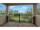 Private balcony overlooking a lush green landscape at 10747 Belfry Cir, Orlando, FL 32832