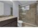 Bathroom with vanity, toilet and large walk-in shower at 10747 Belfry Cir, Orlando, FL 32832