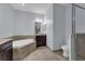 Primary bathroom with soaking tub and separate shower at 10747 Belfry Cir, Orlando, FL 32832