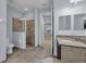Bathroom with shower, toilet and vanity with granite countertop at 10747 Belfry Cir, Orlando, FL 32832