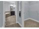 Bathroom with soaking tub, walk-in shower, and double vanity at 10747 Belfry Cir, Orlando, FL 32832
