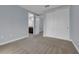 Bedroom with carpet, neutral walls and double door closet at 10747 Belfry Cir, Orlando, FL 32832