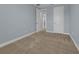 Light and airy bedroom with neutral walls and carpet at 10747 Belfry Cir, Orlando, FL 32832