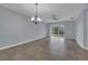Bright dining room with tile floors and access to backyard at 10747 Belfry Cir, Orlando, FL 32832