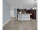 Spacious dining area with tile floors and sliding glass doors at 10747 Belfry Cir, Orlando, FL 32832