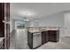 This kitchen boasts granite counters and dark cabinetry at 10747 Belfry Cir, Orlando, FL 32832