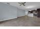 Bright living room featuring tile floors and an open floor plan at 10747 Belfry Cir, Orlando, FL 32832