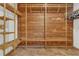 Large cedar closet with wooden built-in storage and shelving at 1121 Trotwood Blvd, Winter Springs, FL 32708