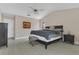 Light-filled main bedroom featuring vaulted ceilings, ceiling fan, and neutral paint at 1121 Trotwood Blvd, Winter Springs, FL 32708