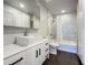 Modern bathroom with white vanity, mosaic tile shower, and contemporary fixtures at 155 S Court Ave # 1610, Orlando, FL 32801