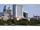 Scenic city view with a gleaming high-rise residential building on the skyline at 155 S Court Ave # 1610, Orlando, FL 32801