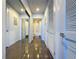 Hallway with mirrored closet and bathroom at 155 S Court Ave # 1610, Orlando, FL 32801