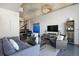Modern living room with a grand piano, comfortable seating, and stylish decor at 155 S Court Ave # 1610, Orlando, FL 32801