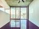 Modern living room with high ceilings and expansive windows at 155 S Court Ave # 1610, Orlando, FL 32801