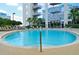 Inviting outdoor pool with lounge chairs and lush landscaping, perfect for relaxation at 155 S Court Ave # 1610, Orlando, FL 32801