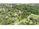 Aerial view of home showcasing a mature neighborhood with tree-lined streets at 5100 Linwood Cir, Sanford, FL 32771