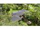 Overhead view of house highlighting mature trees and landscaping at 5100 Linwood Cir, Sanford, FL 32771