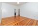 Bright bedroom featuring wood floors and neutral walls at 5100 Linwood Cir, Sanford, FL 32771